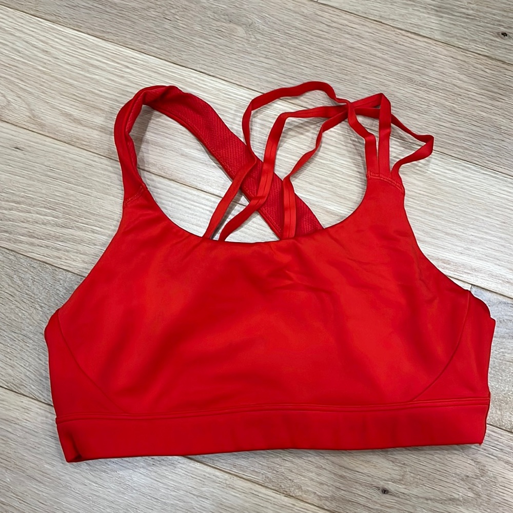 Athleta cherry red strappy sports bra. Worn 2x. Sz M no pads.